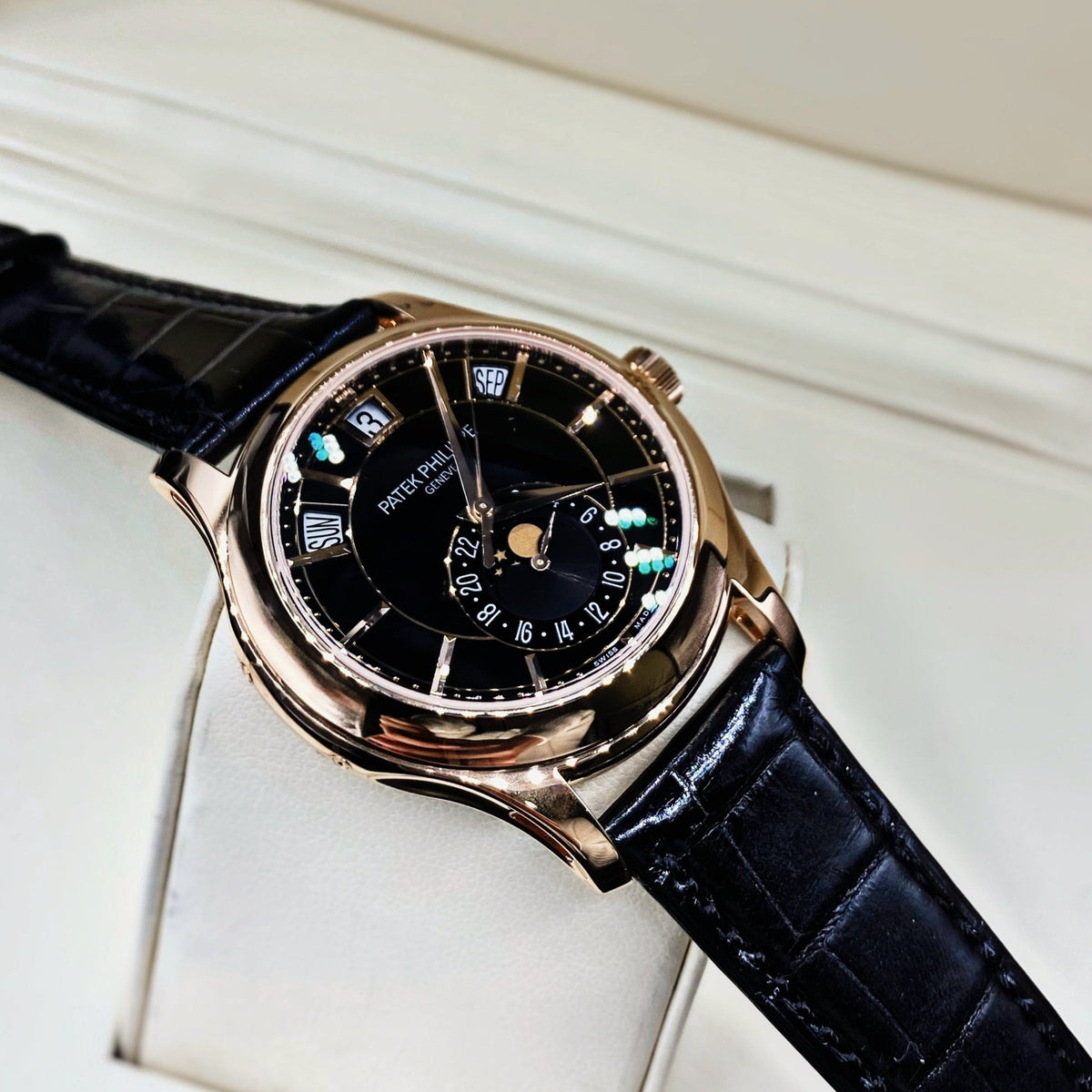 Patek Philippe Complications Silver Moon Phase 40mm Watch Ref 5205R 010 Black Moon Phase Dial in 18K Rose Gold Shiny Black Alligator Strap