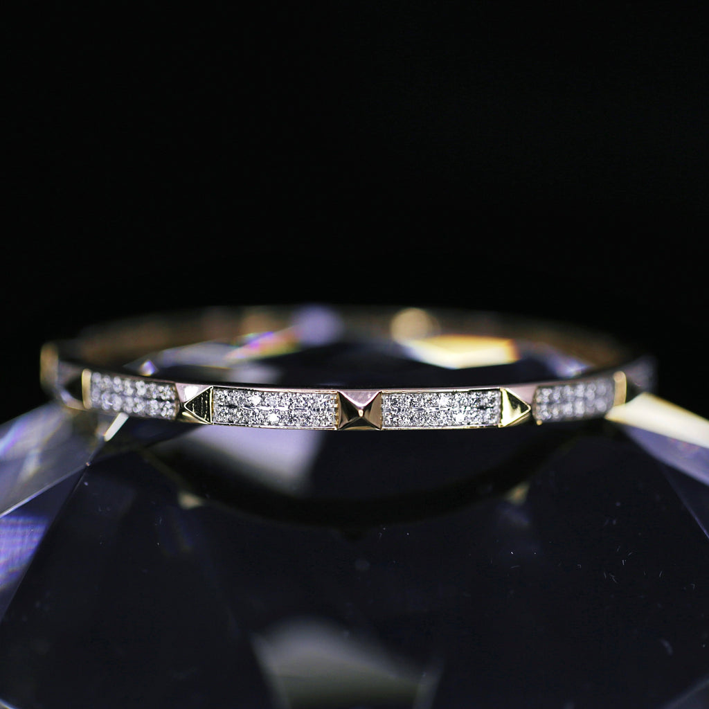 14k Yellow Gold Diamond Bangle Bracelet features 1.03ct of TDW