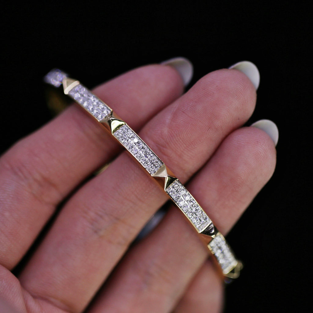 14k Yellow Gold Diamond Bangle Bracelet features 1.03ct of TDW