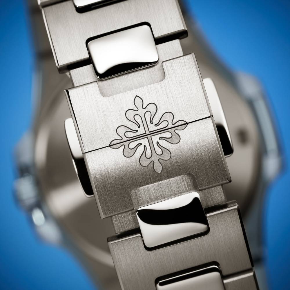 2025 Model Patek Philippe Nautilus 32 mm Watch - Ref: 7010-1G-013 - Azure Blue Wave Motif Dial in 18K White Gold Bracelet
