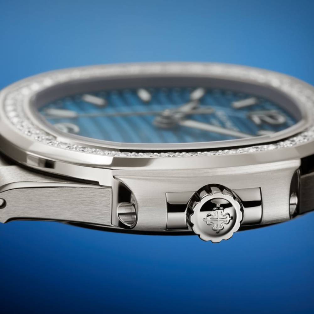 2025 Model Patek Philippe Nautilus 32 mm Watch - Ref: 7010-1G-013 - Azure Blue Wave Motif Dial in 18K White Gold Bracelet