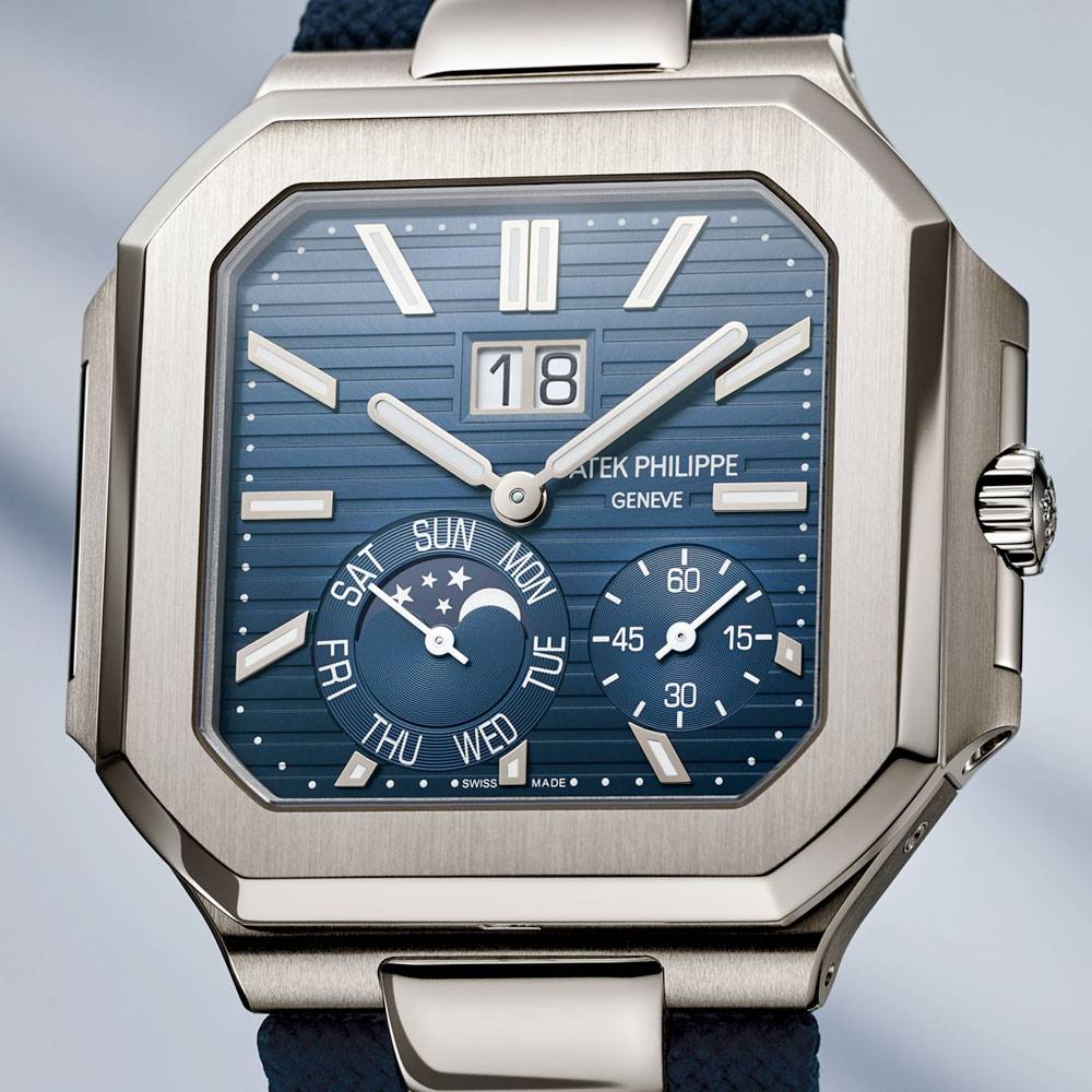 Patek Philippe Cubitus 45 mm Men's Watch - Ref: 5822P-001 - Grand Sunburst Blue Dial, Platinum Case, Navy Blue Strap Bracelet