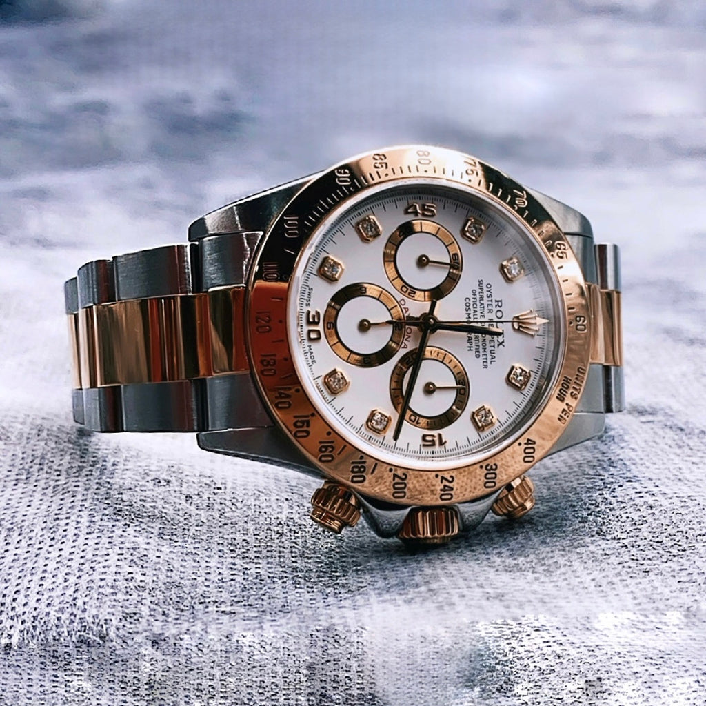 Rolex Cosmograph Daytona 40 mm | Two-Tone 18k Yellow Gold and Stainless Steel Oyster bracelet | White dial 18k Yellow gold bezel | Men's Watch 116523-0057