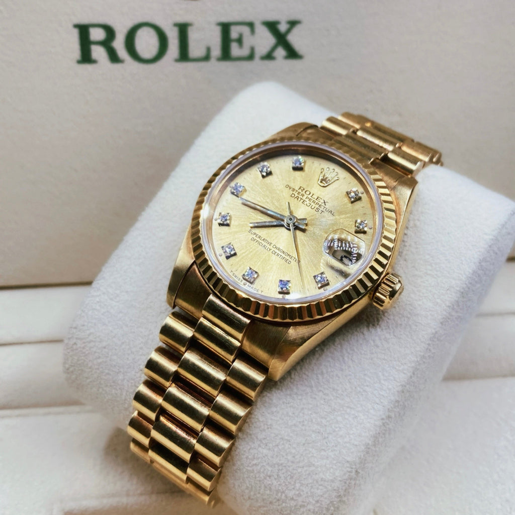 Rolex Datejust 31 mm | 18k Yellow gold President bracelet | Champagne dial Fluted bezel | Unisex Watch 68278