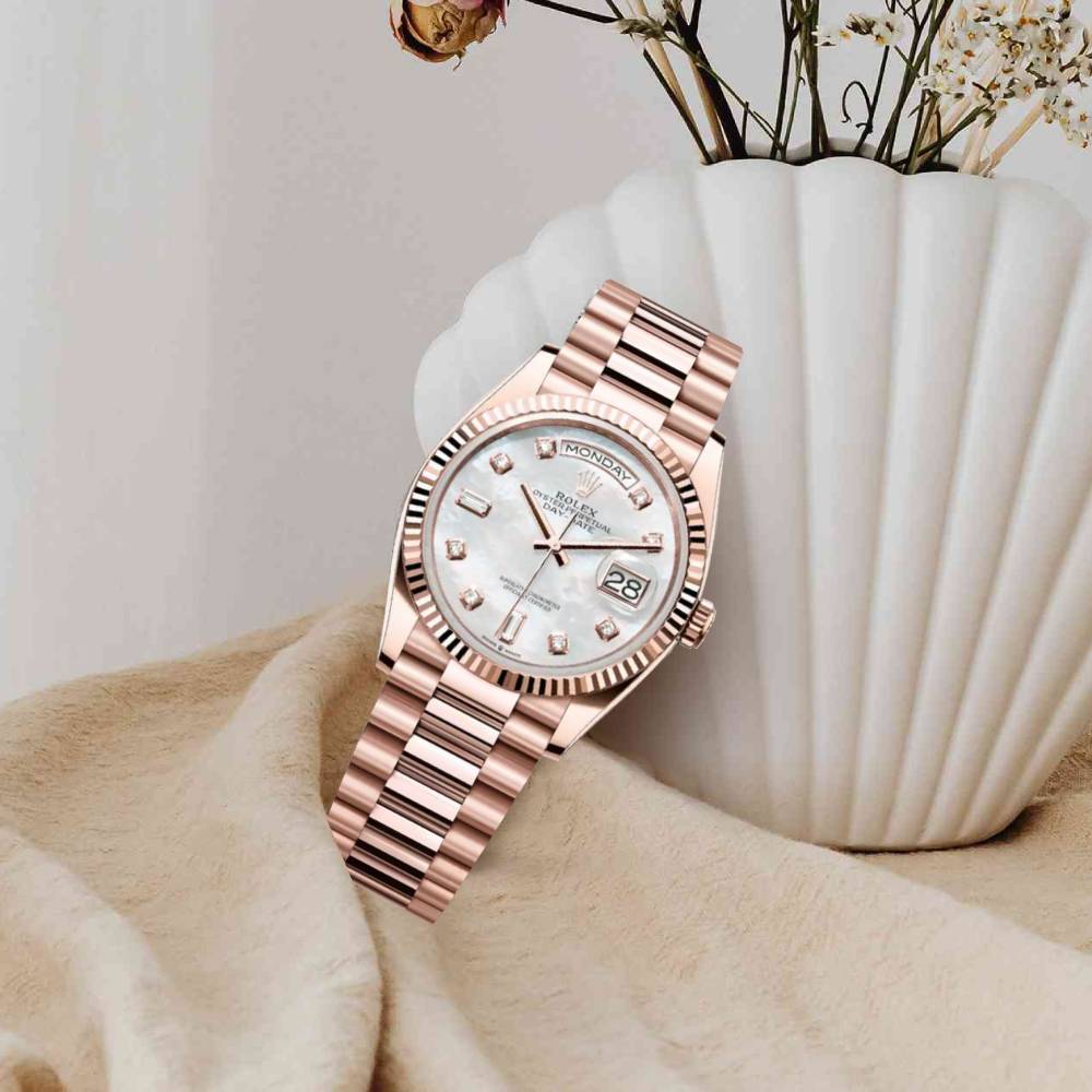 Rolex Day Date 36mm - Ref: 128235-0029 - White Mother of Pearl Diamond Dial & Fluted Bezel, 18K Rose Gold President Bracelet Watch