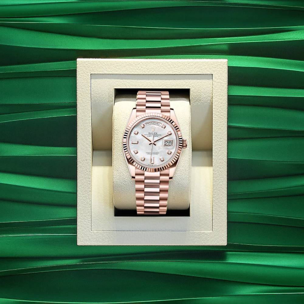 Rolex Day Date 36mm - Ref: 128235-0029 - White Mother of Pearl Diamond Dial & Fluted Bezel, 18K Rose Gold President Bracelet Watch