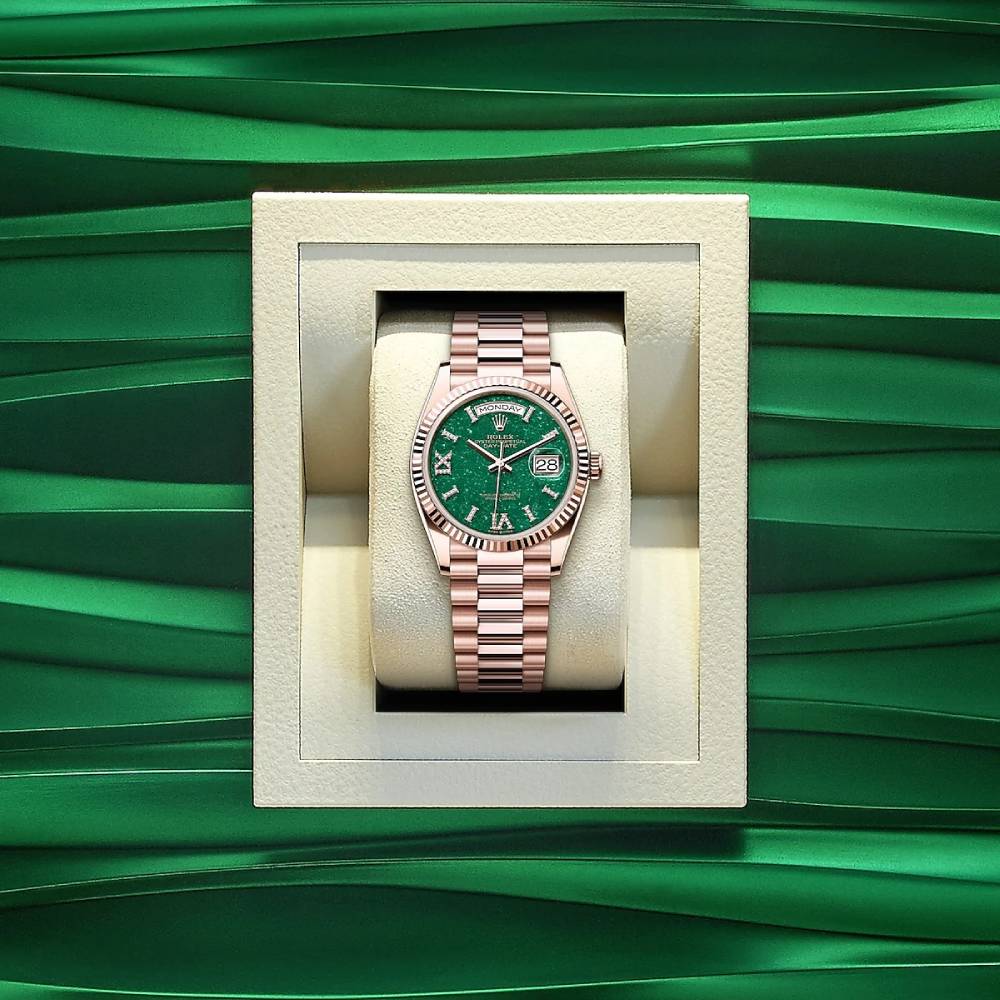 Rolex Day Date 36mm - Ref: 128235 - Green Aventurine Roman Diamond Dial & Fluted Bezel, 18K Rose Gold President Bracelet Watch