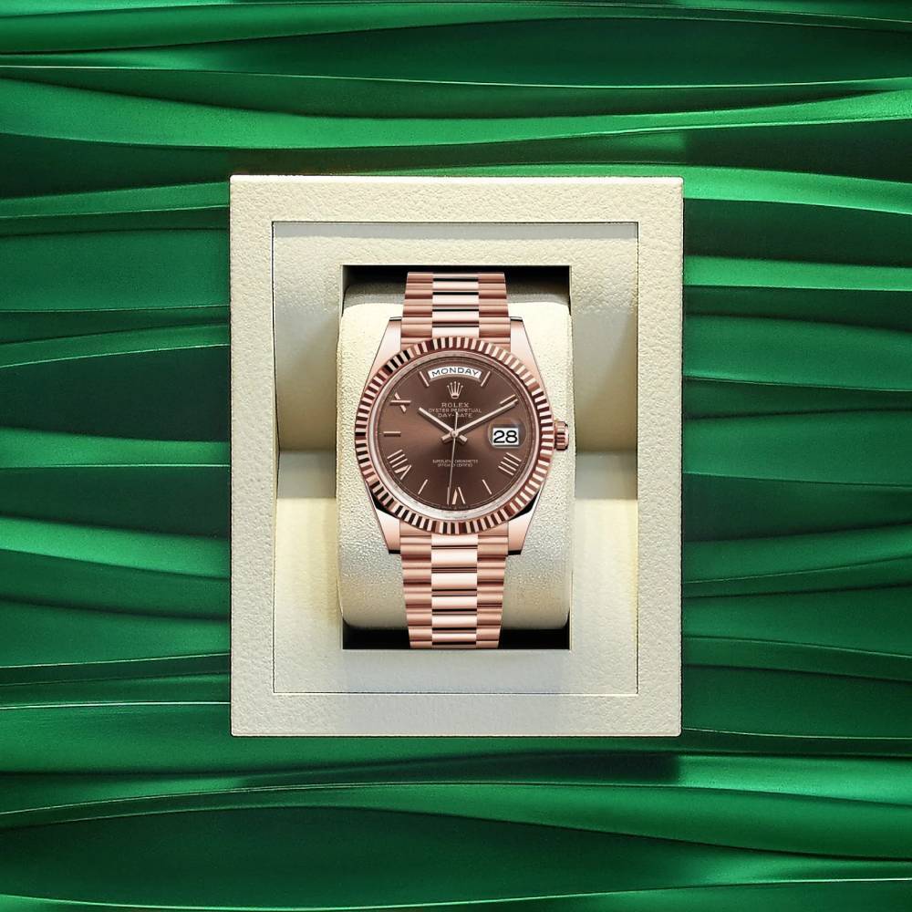 Rolex Day Date 40mm - Ref: 228235-0002 - Chocolate Roman Dial & Fluted Bezel, 18K Rose Gold President Bracelet Men's Watch