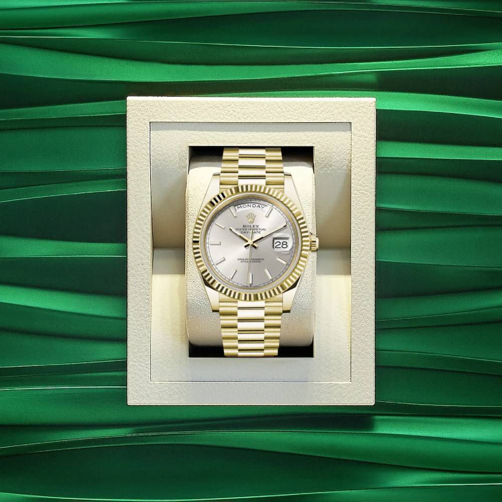 Rolex Day Date 40mm - Ref: 228238 - Silver Stick Dial & Fluted Bezel, 18K Yellow Gold President Bracelet Men's Watch