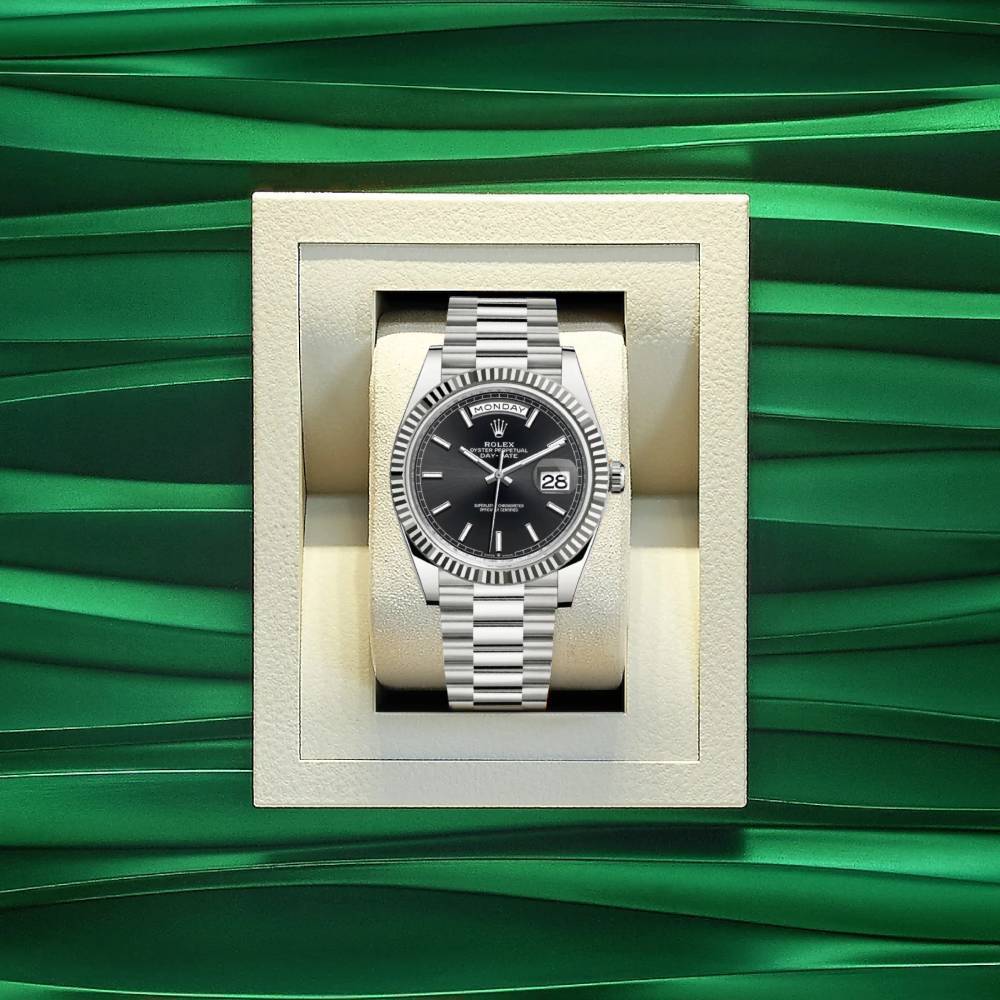 Rolex Day Date 40mm - Ref: 228239-0004 - Black Stick Dial & Fluted Bezel, 18K White Gold President Bracelet Men's Watch