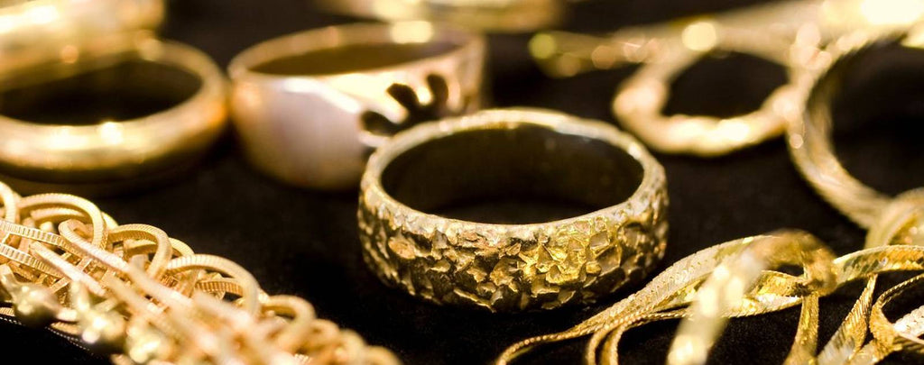Person comparing jewelry offers from different buyers in NYC