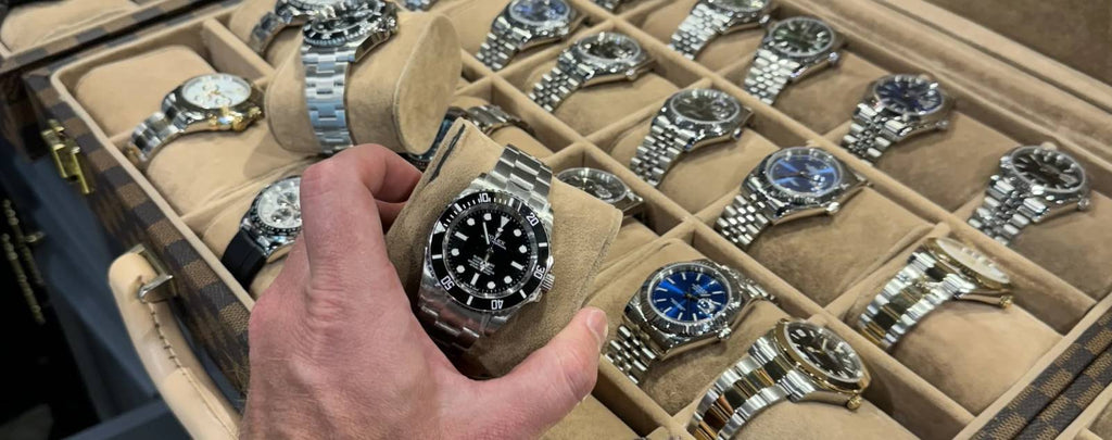 A Rolex watch being packaged securely for shipping, or a close-up of a safe online payment transaction for selling a Rolex.