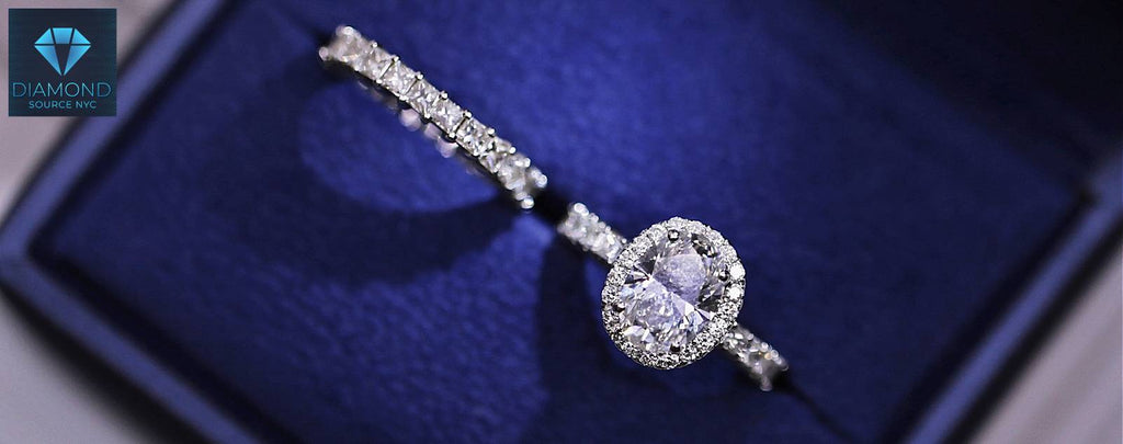 Examining antique jewelry for sale in NYC