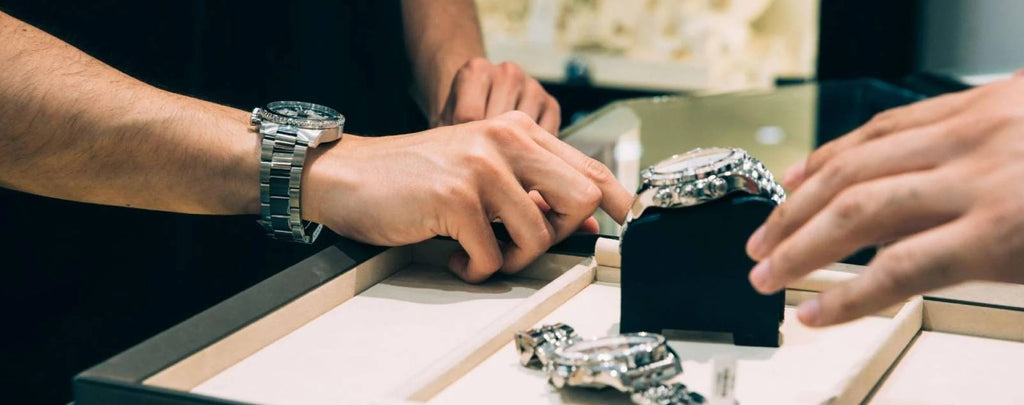 Selling a luxury watch, like Rolex or Patek Philippe, in New York City.