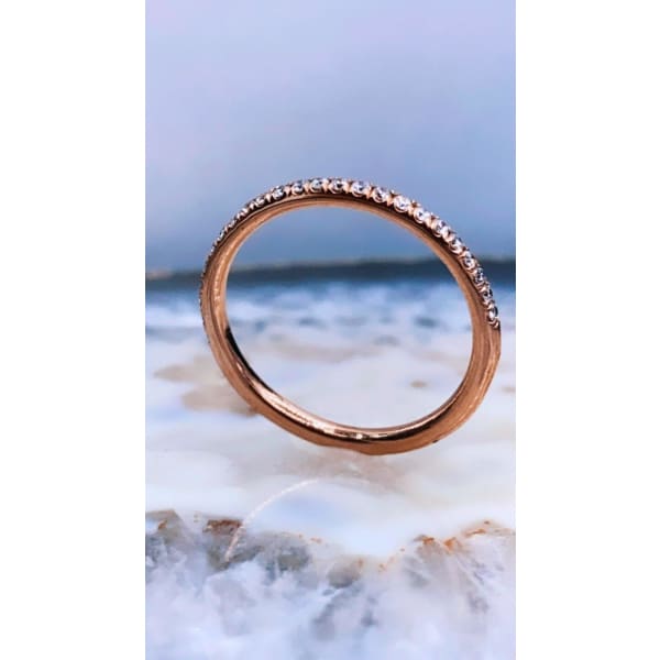 14k Rose Gold Half-way Eternity Band features 24 Round cut Diamonds in 0.30 CT. of Total Diamond Weight