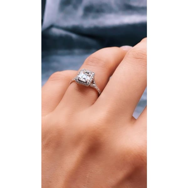 14K White Gold Engagement Ring feature Center 0.79ct Emerald Cut Diamond,  Ring on a finger