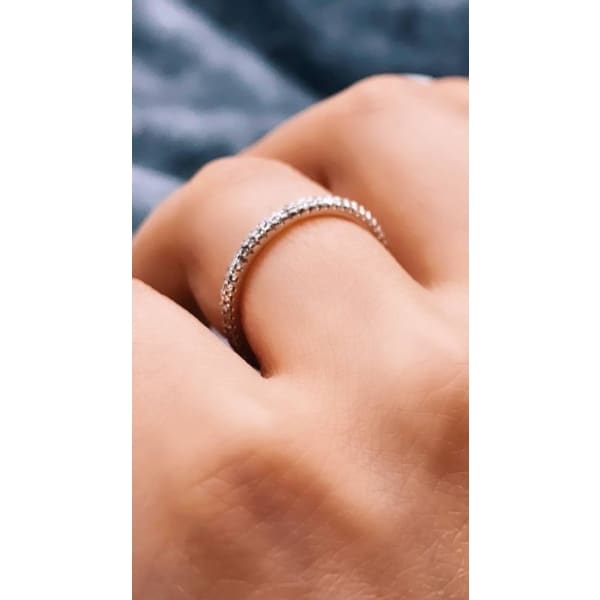 18k White Gold Eternity Comfort Fit Band features Pave Round Cut Diamonds, Ring on a finger