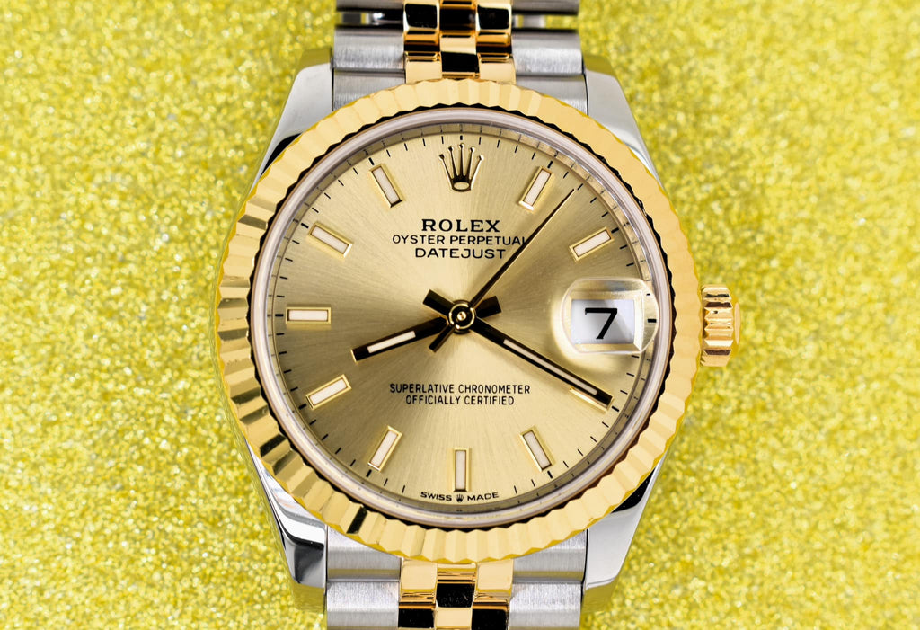 Rolex, Steel and Yellow Gold Datejust 31 mm - Fluted Bezel - Champagne Index Dial - Jubilee Bracelet, like new condition