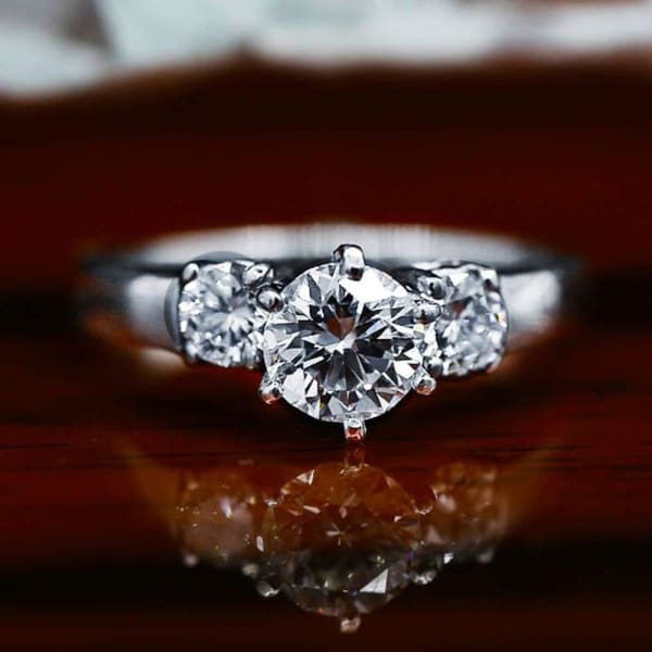 Beautiful three-stone Platinum engagement ring with 1.01ct Center Round Diamond ENG-11500