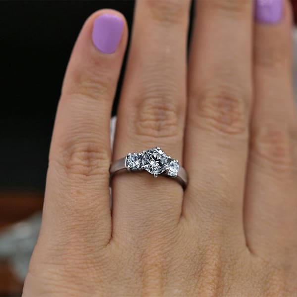 Beautiful three-stone Platinum engagement ring with 1.01ct Center Round Diamond ENG-11500, Ring on a finger