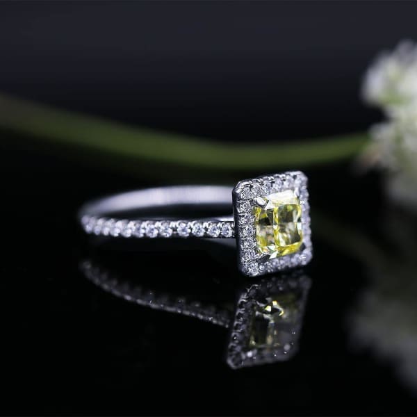 Classic Elegant Platinum engagement ring with center 1.05 Radiant Fancy Yellow Diamond DS-4564500, enlarged image