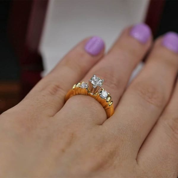 Classic Three-Stone Yellow Gold Engagement Ring features center 0.50ct Round Diamond ENG-5500, Ring on a finger