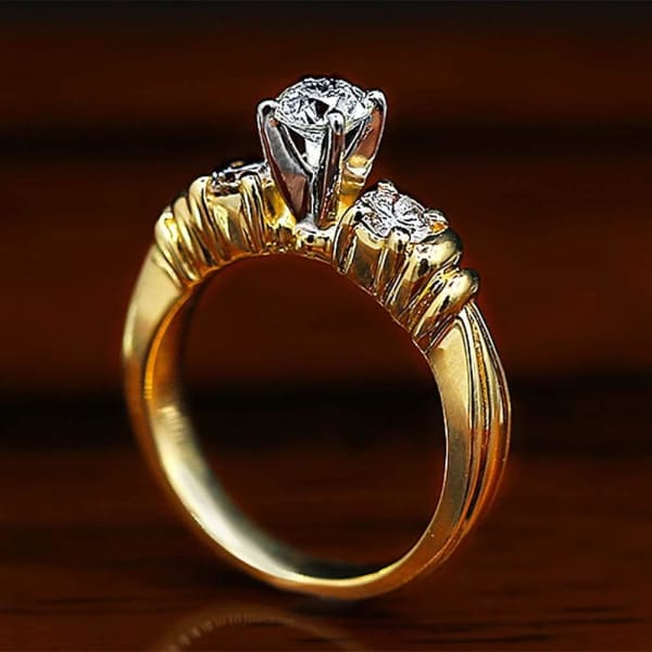 Classic Three-Stone Yellow Gold Engagement Ring features center 0.50ct Round Diamond ENG-5500