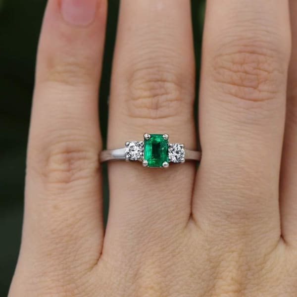 Elegant Engagement Ring with 1.00ct Center Green Emerald and two Round Diamonds on sides Eng-5001, Ring on a finger