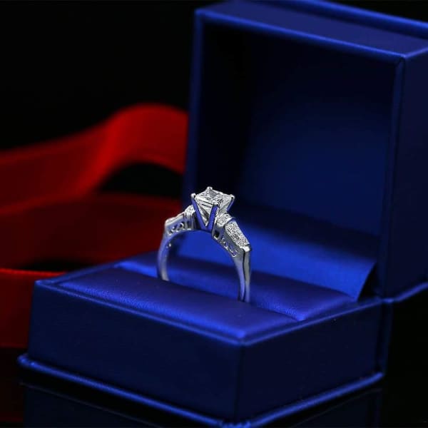 Elegant Engagement Ring with Center 1.30ct Princess Cut Diamond DS-4562500, Ring in packing, Side