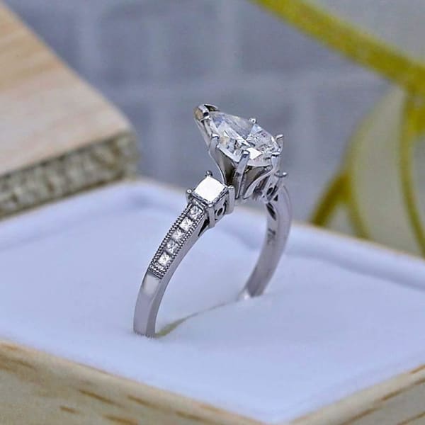 Engagement Ring features Center 1.00ct Pear Shape Diamond ENG-7509