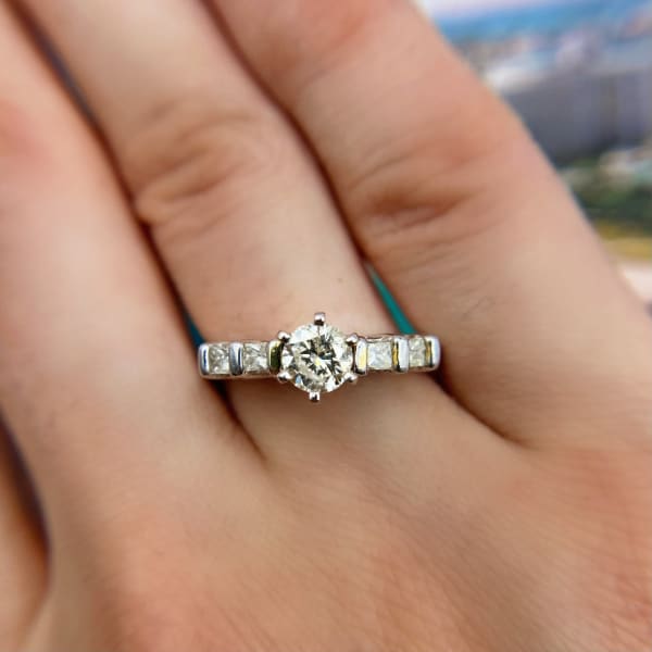 Engagement Ring with Center Round and Princess cut Diamond 