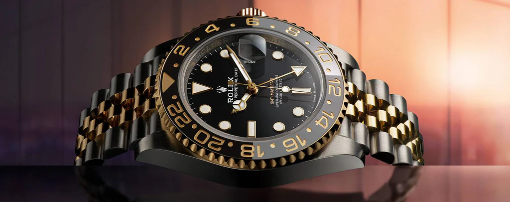 Collection of vintage and modern Rolex GMT-Master models showcasing design evolution"