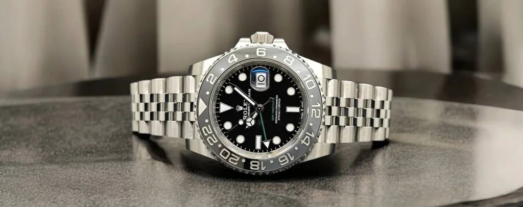 Close-up of Rolex GMT-Master II showcasing the independent GMT hand and Cerachrom bezel