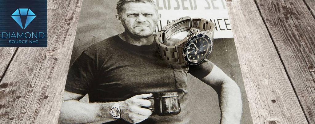 Steve McQueen wearing an iconic watch.