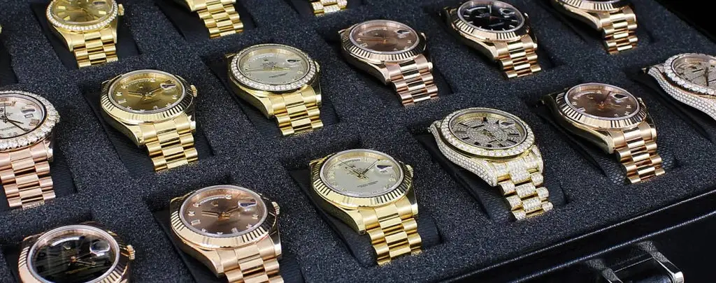 A collection of estate jewelry, including rings, necklaces, and brooches.