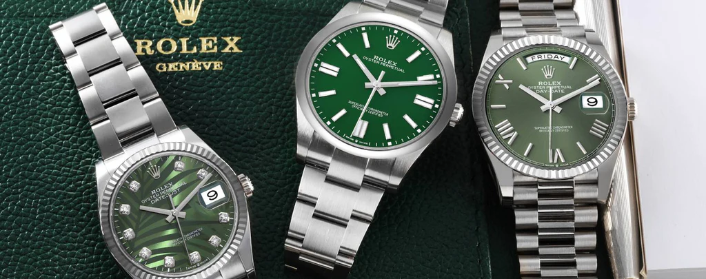 Jeweler examining a Rolex watch for authenticity.