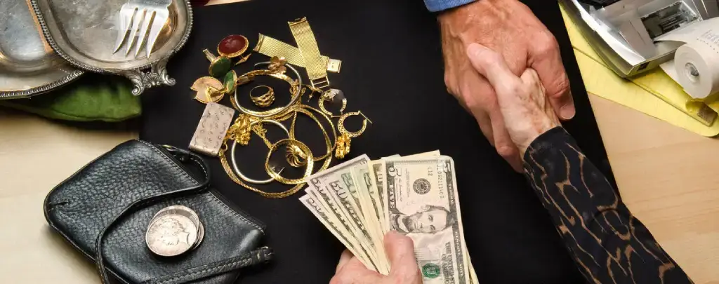 Customer selling jewelry at a trusted jewelry store.